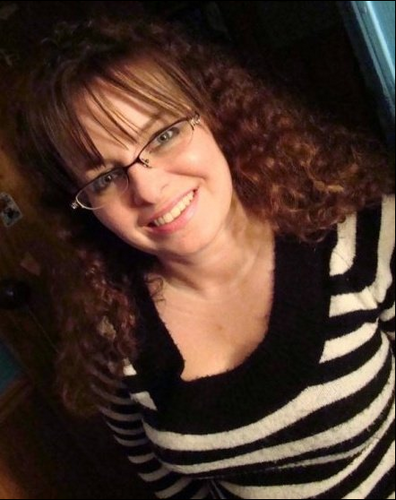 Sarah Merchant - Web designer/ coder for modSpot, owner/ artisan of Sarah's Naturals, photographer and woman who loves her pet rabbits.