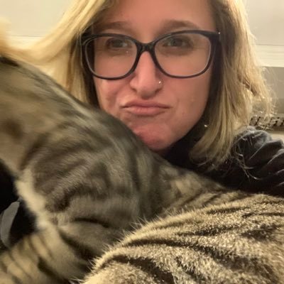 witty cat lady who loves to read and watch tv and cook