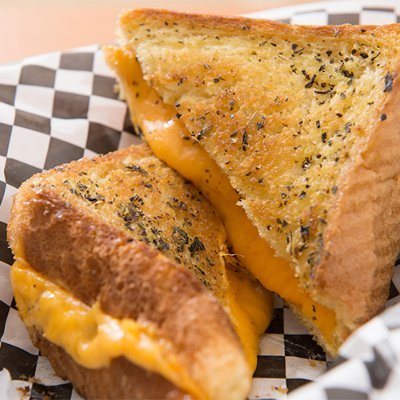 Columbus' original grilled cheese truck, The Cheesy Truck! Bringing specialty grilled cheese sandwiches to the streets of Columbus.