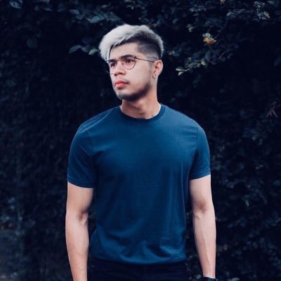 HajTobias's profile picture. A grayscale covered shadow man and a beautiful soul trapped in a multisized cages of flesh and blood