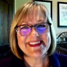 A linguist focused on successful workplace language.