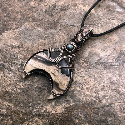 I am a self taught wire wrap jewelry artist from Fort Wayne, Indiana. I wire wrap all kinds of stones, shell, natural and man made glass. Come visit me!!