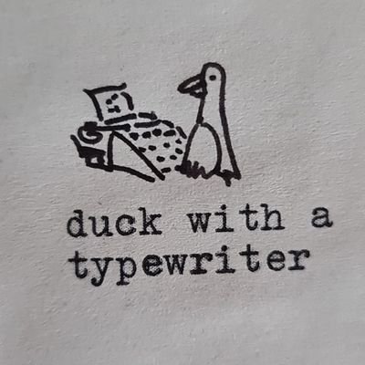 A duck. With a typewriter. Just that. Maybe more. You'll never know.