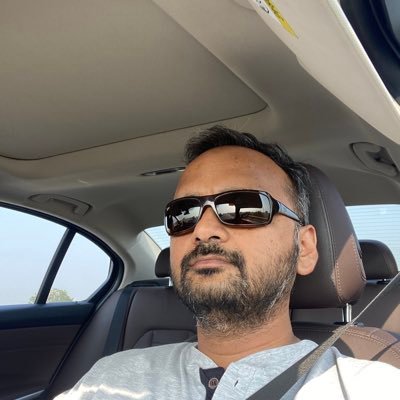 Hindu who respects and tolrates other religion. Industrilist , Indian , beliver in karma