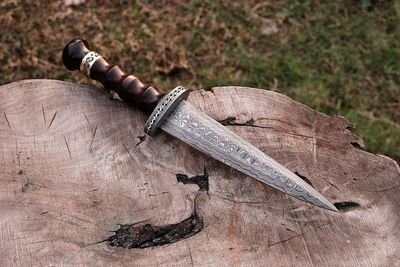 We are manufacturer and exporters of all kinds of Damascus hunting and pocket knives also swords