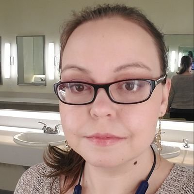 CoconutHalf's profile picture. she/her