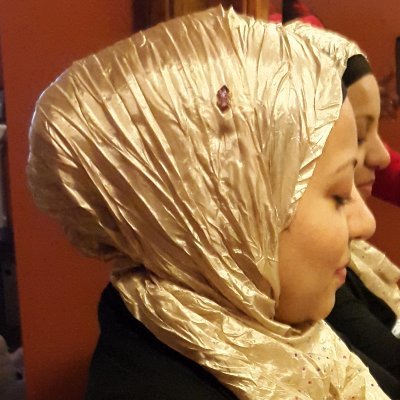 Indian/African American. Wife. Mother of 4. Writer?