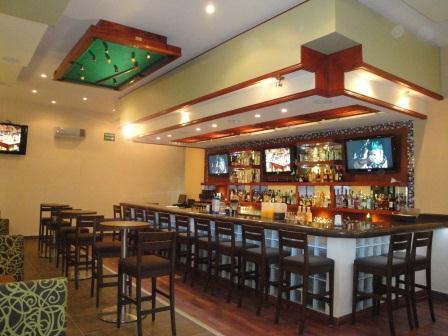 Señor Puck's Sports Bar and Grill.  Located in Huatulco in the beautiful Marina Park Plaza Condo Hotel.  Great food, sports and cocktails!