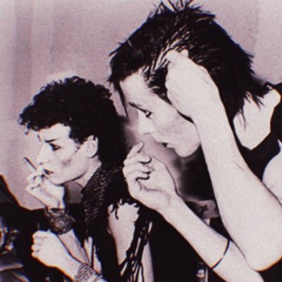 posting daily pictures of the members of bauhaus and love and rockets!