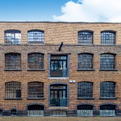 Hay stable conversion in central London featuring two stunning apartments