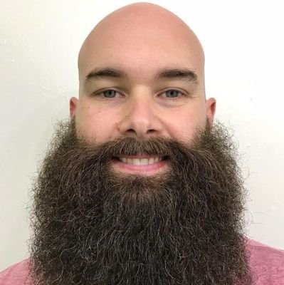 CamTaylor25's profile picture. bald bearded and beautiful
