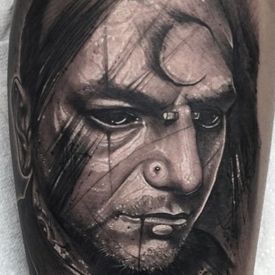 Artist / Founder of Dark Trash Realism Tattoo style.