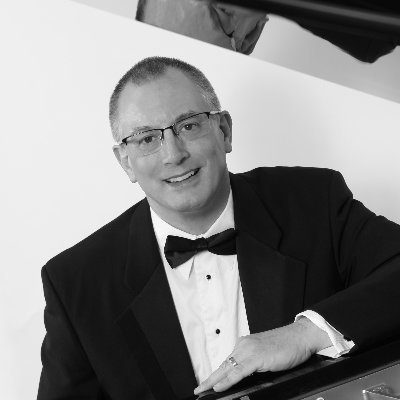 Eric Carlson is a Wisconsin-born composer and pianist.  Eric's  mission is to give hope & encouragement through music, words & enthusiasm for life!