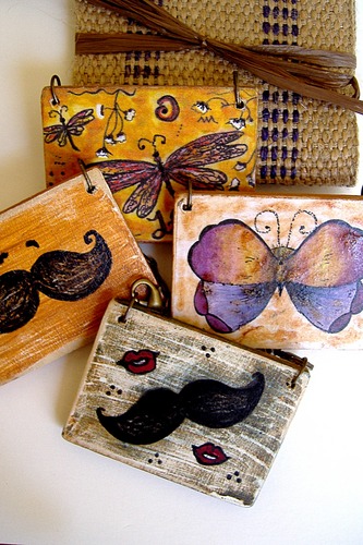 I'm one of those crazy southern artist working out of my home. I do an old vintage inspired technique called schoolgirl art. Pen and ink on wooden boxes.