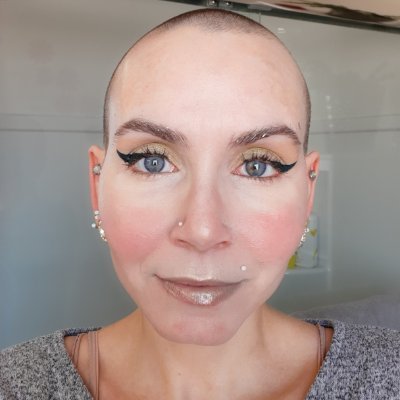 45-year-old mother of 2 cats and wife of 1 husband who likes to garden, crochet, read, and play with makeup & nails.  she/her