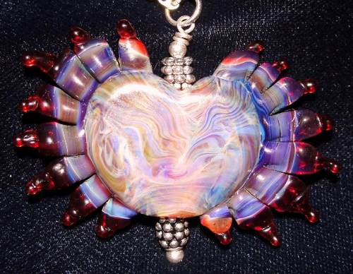 Lillian Benrubi, Upper York Region, lampworker, using soft and hard glass, making glass beads and designing jewellery.