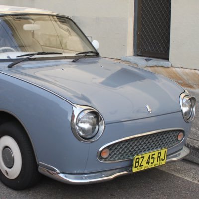 The 1991 Nissan Figaro was a retro-style mini-roadster that was introduced by Nissan in 1991. It was designed specifically for the Japanese market and was only