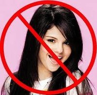 I Hate Selena!I'm gonna KILL her if i see that BITCH'S face. Sorry Justin...sorry that your girlfriend's a FAGOT WHORE!!!!
