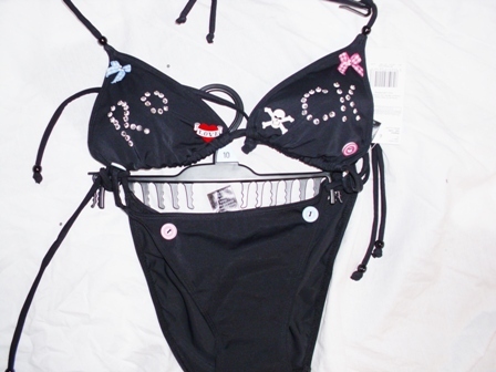 RocknRollBikini's profile picture. Sunshine & Rock n Roll is a unique range of bikini beach wear. Each Bikini is Individual and no two will ever be the same. Stand out in the Sunshine!!!