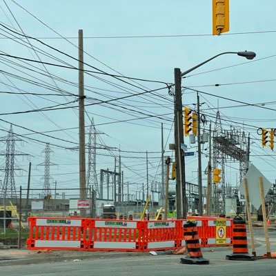 I am a city that is ok with crooked wooden poles and dangling wires above your heads. Looking to improve public realm, add big trees and get bike lanes right.