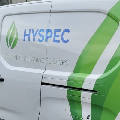 A focused business owner and manager working in the cleaning and services industry.