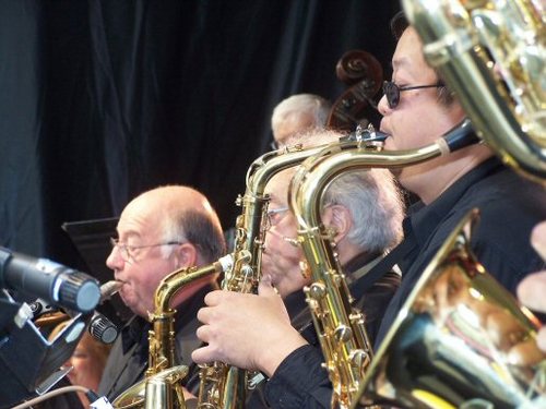 The Megacity Big Band is an 18 piece jazz ensemble that performs both songs made famous in the 30-40's as well as modern works in the swing style