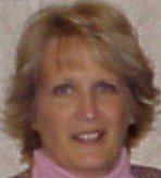 Retired school teacher, now working as a parish secretary .