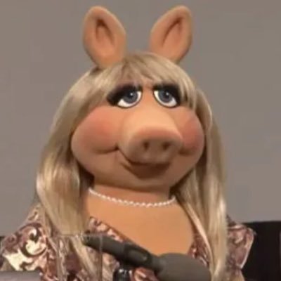 TheRealMsPiggy's profile picture. Marjorie Taylor Greene can KISS MY JEWISH ASS