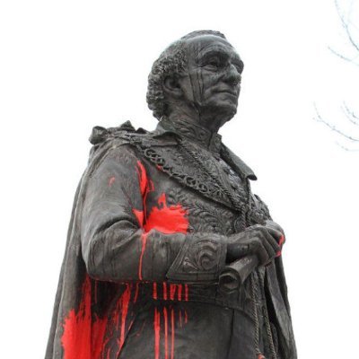 I am a statue of Sir John A McDonald, creator of Canada's residential school system. Kingston, Ontario, is somewhat embarrassed by me.