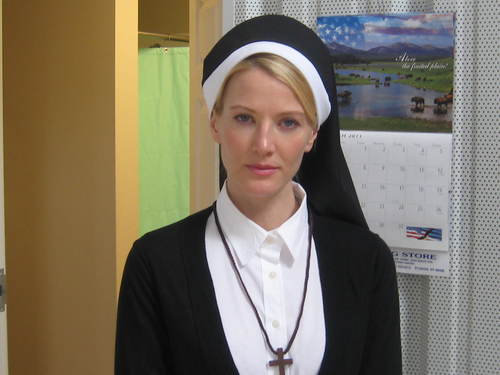 A young nun (played by Julianna Robinson) is trapped overnight in a rural storage facility, and subsequently finds herself the mouse in a madman's cage.