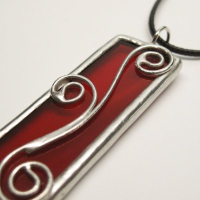 Modern, yet whimsical handcrafted stained glass jewelry by artist Maria Burd. Each unique piece is inspired by the magic of the natural world, its vibrant color