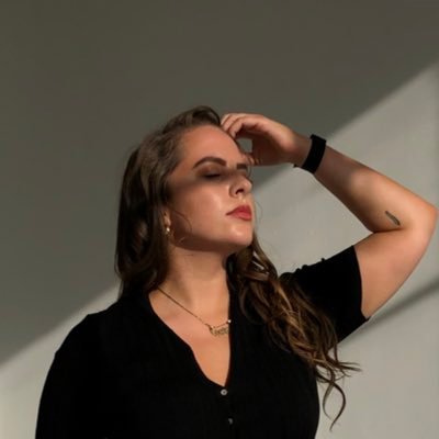 tinatheg's profile picture. cat eyes and good vibes