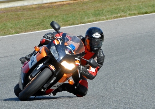 rides all things with 2wheels; likes precision of tarmac and challenge of dirt