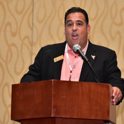 proud father...Greek...Panamanian..American... payments expert...prolific speaker...