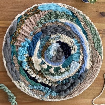 fragmentweaving's profile picture. woven art by @katiekeeshen - header by @dancynrew - sweet mother i cannot weave etc etc