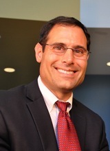 I am robot industry veteran and thought leader on automation as key to manufacturing competitiveness