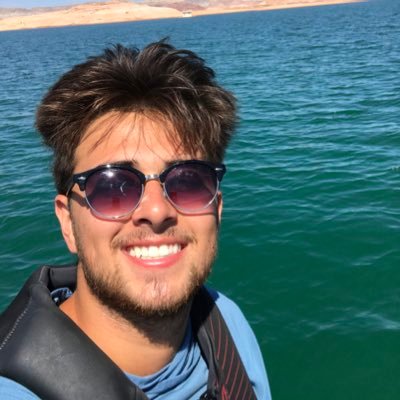 ZackYubeta's profile picture. big hair, bigger personality