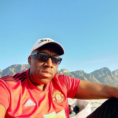 Father | Husband | Mentor | music lover | Manchester United fan | finance professional | businessman |