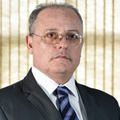 Doutor em Economia (PUC-Rio). Ex-analista do BCB. Pesquisador e ex-diretor do IPEA. ex-presidente do IJSN. Conselheiro do FBSP.