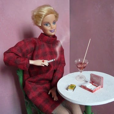 BitterBarbie420's profile picture. she ain’t smiling