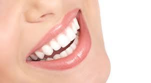 Laser teeth whitening practitioner at home or office,