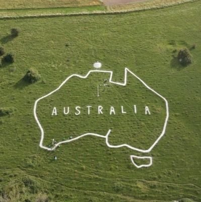 The Map of Australia Trust. A group of volunteers restoring a WW1 Chalk Badge created in 1917 by Australian Soldiers stationed at Hurdcott Camp in Wiltshire.