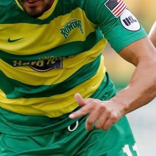 Pointing toward championships / posing as a legend / Directing my body while dancing Samba / Inducted in the Tampa Bay Rowdies famous digits for rings