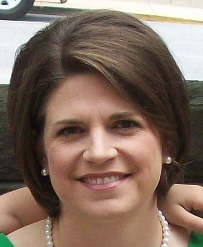 wife, mother, Christian, teacher, VB coach, someone who enjoys life with family and friends