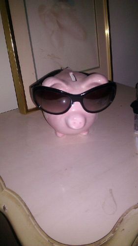 Half human, half still pig with glasses. Love receiving money in my hand or through the slot at the top of my head. Most times quiet always glamorous!