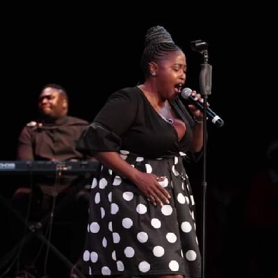 A beautiful, ever smiling plus size, with a beautiful voice