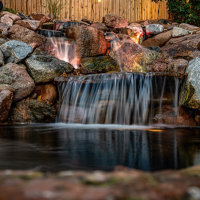 Creating custom outdoor living spaces. We specialize in water features