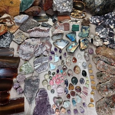 Stones & Homegrowns on Crystal Creek is a lapidary team working our small homestead in western Maine. We cut and polish stones and create one-of-kind jewelry.