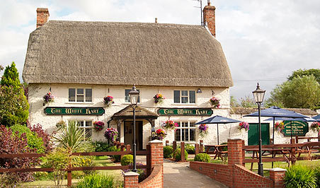 At the heart of the community... warm welcome roaring fires, glorious food and great Wadworth ales - come and say hello to Roger, Kay, Charlie and the team.