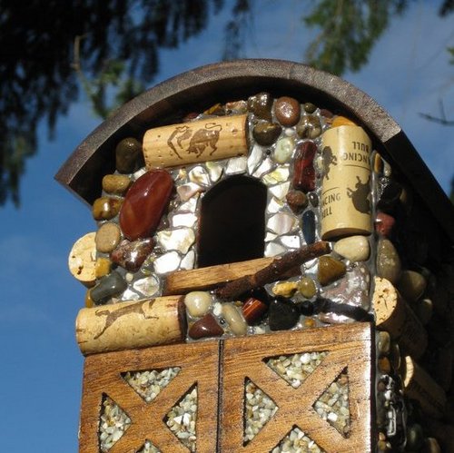 I make mosaic birdhouses out of wine corks,colorful stones and ocean agates.I LOVE art,and nature inspires me.I love red wine,kayaking,my cat,dog & man